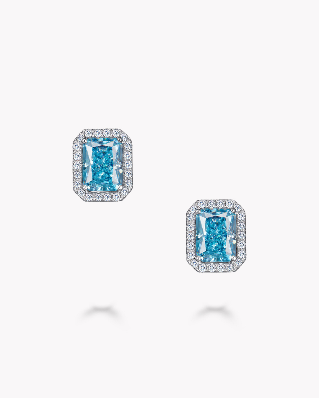 Серьги-пусеты с голубыми Fancy Blue и бесцветными муассанитами, 3,91 карата