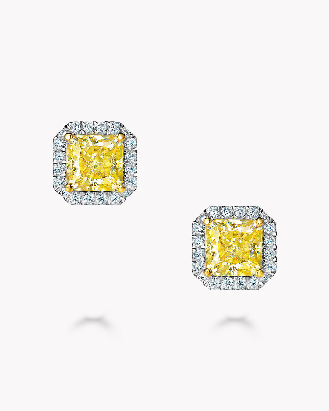 Пусеты с желтыми Fancy Yellow и бесцветными муассанитами, 2,47 карата*